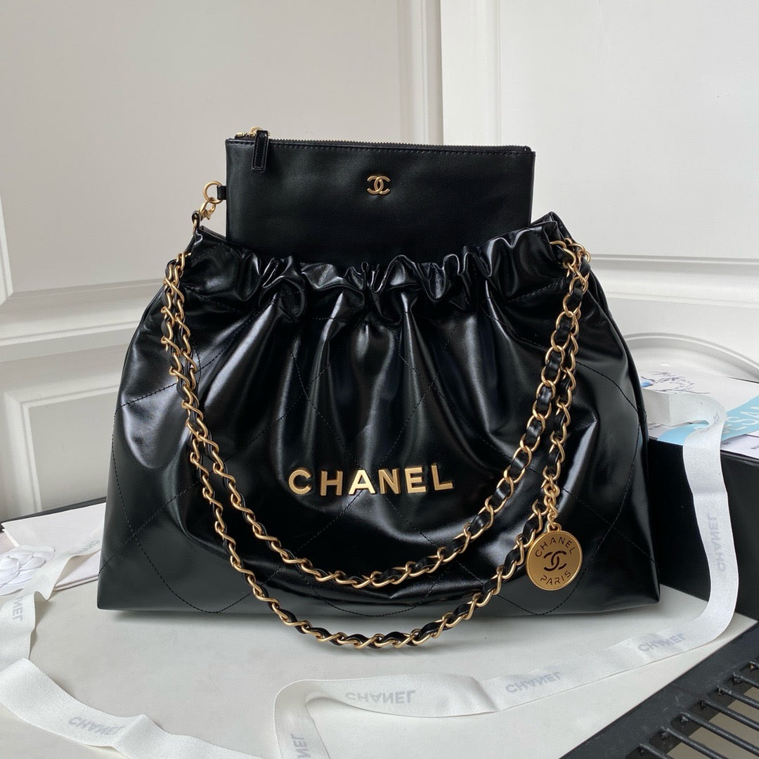 CHANEL 22 - SHINY CALFSKIN & GOLD TONE METAL, BLACK