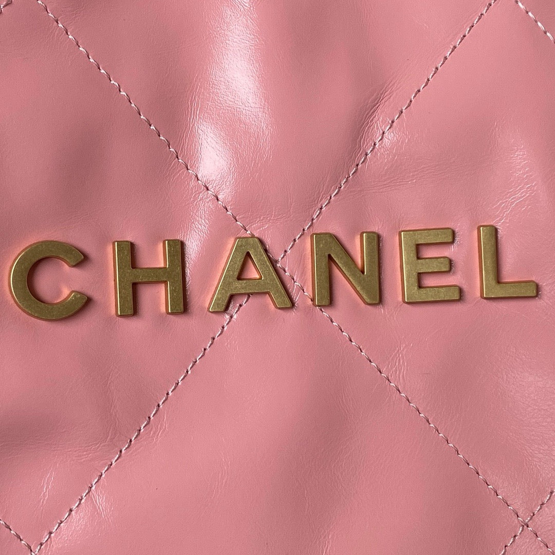 CHANEL 22 - SHINY CALFSKIN & GOLD TONE METAL, PINK