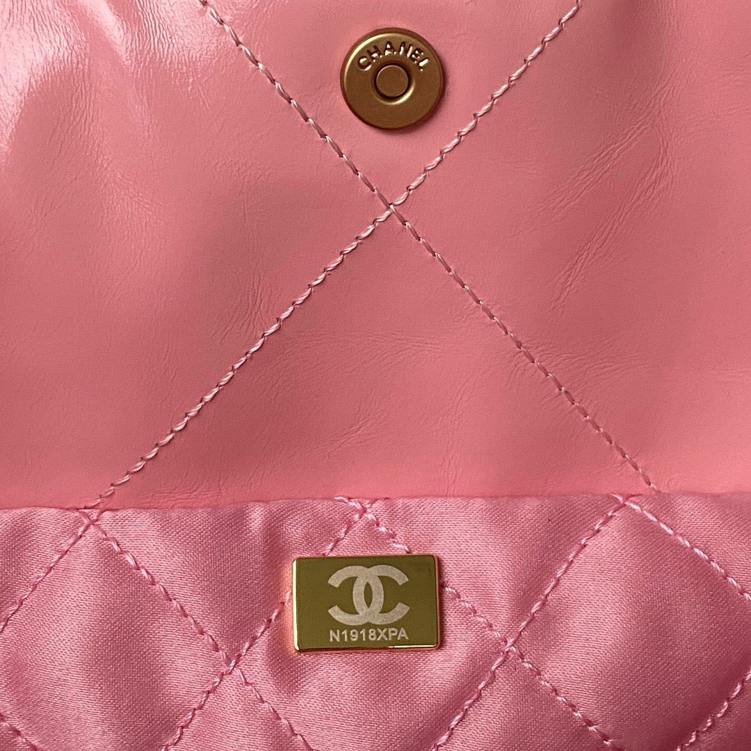 CHANEL 22 - SHINY CALFSKIN & GOLD TONE METAL, PINK